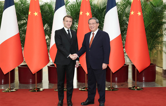 李强会见法国总统马克龙